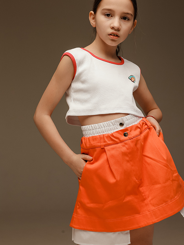 Коралловая детская юбка с поясом-имитацией нижнего белья и хлопковой вставкой